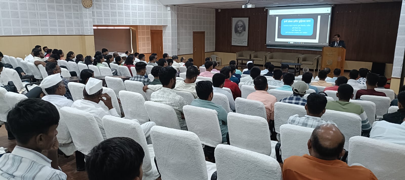 Sunil Khandbahale addressing to Farmers, Students and Professors on AI in Agriculture